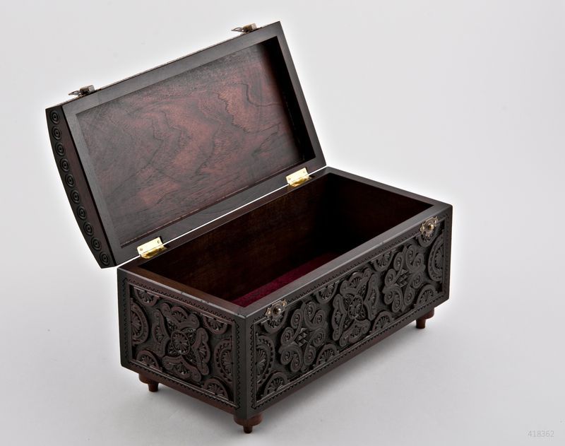 Wooden rectangular jewelry box.