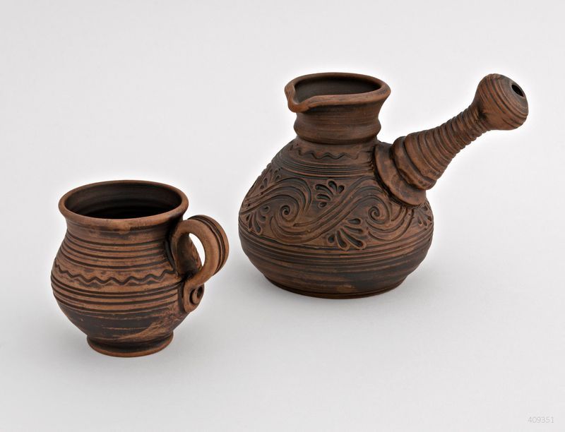 Ceramic coffee pot made of red clay.