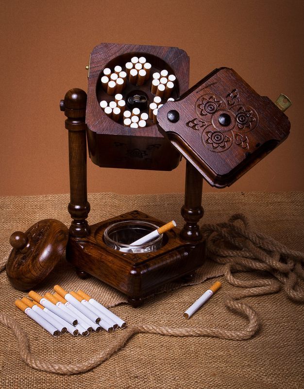 Wooden cigarette smoking set with ashtray and cigarette box.