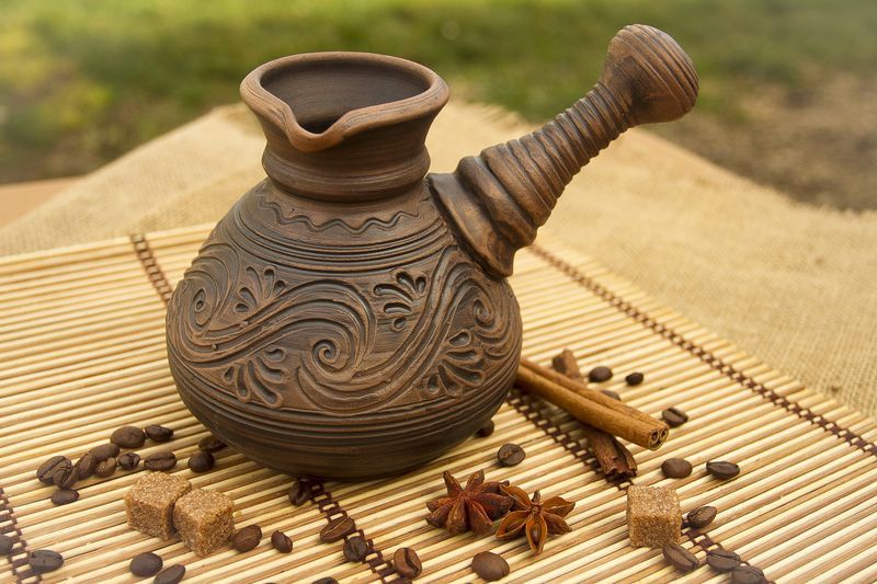 Ceramic coffee pot made of red clay.