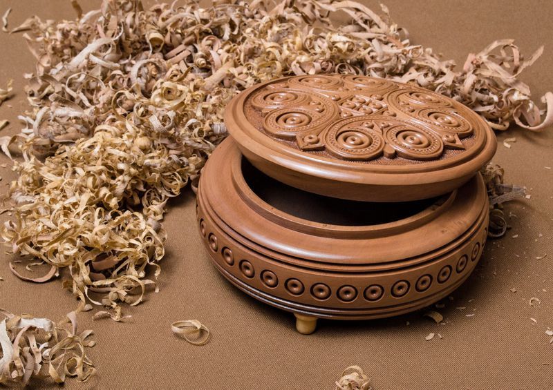 Handmade round wooden jewelry box.