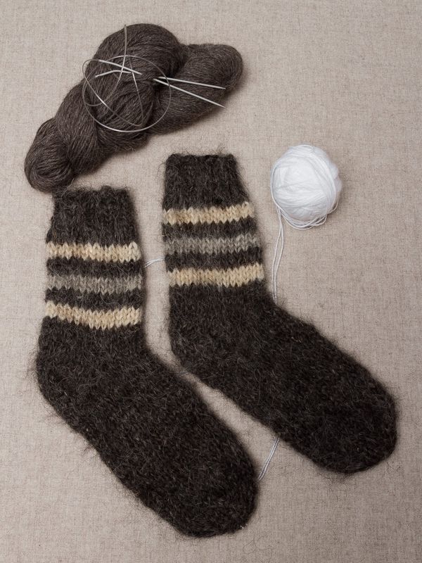Warm woolen socks for men and women knitted by hand