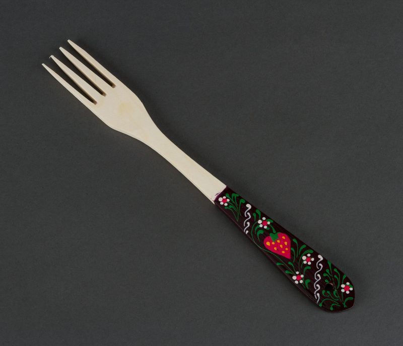Wooden fork with patterned handle