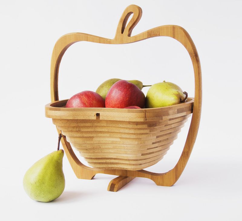Fruit wooden transformer bowl made of natural wood.