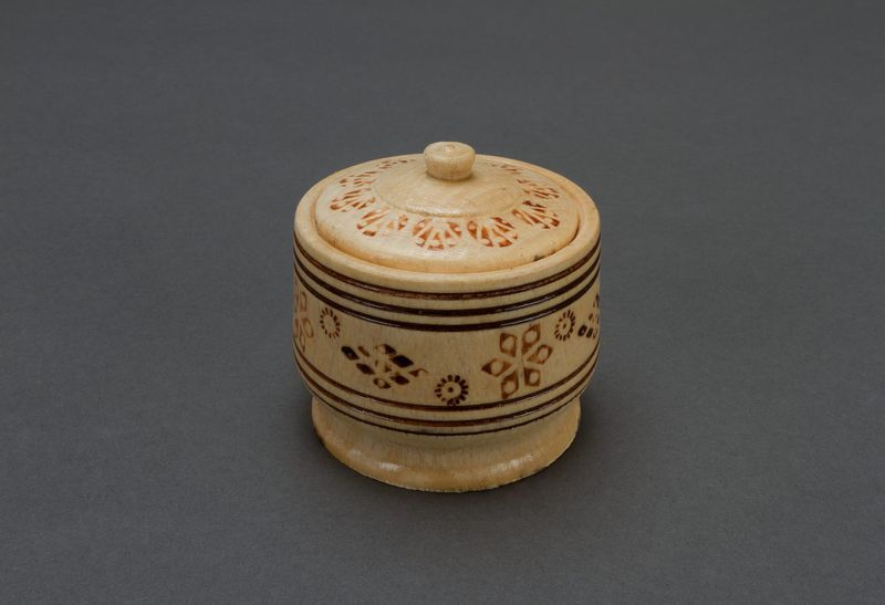 Wooden salt pot with a lid