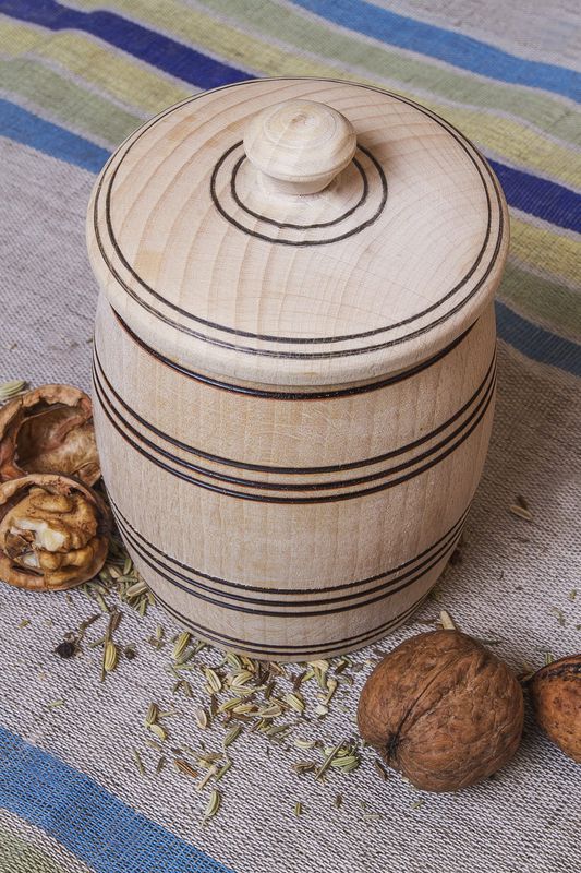 Wooden jar with lid for spices and seasonings.