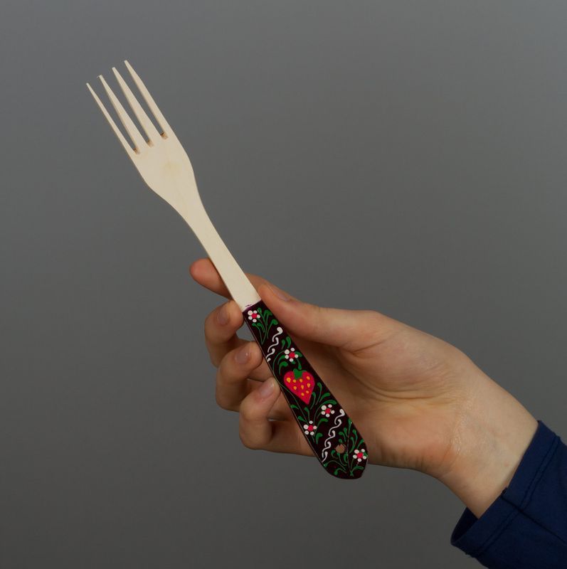 Wooden fork with patterned handle