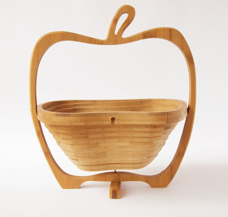 Fruit wooden transformer bowl made of natural wood.