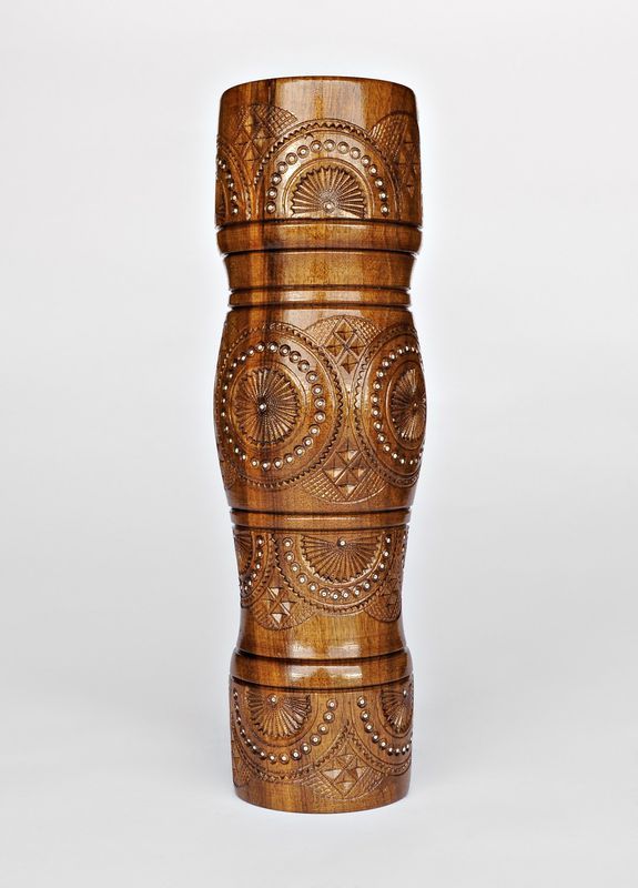 Decorative wooden table vase inlaid with beads. 