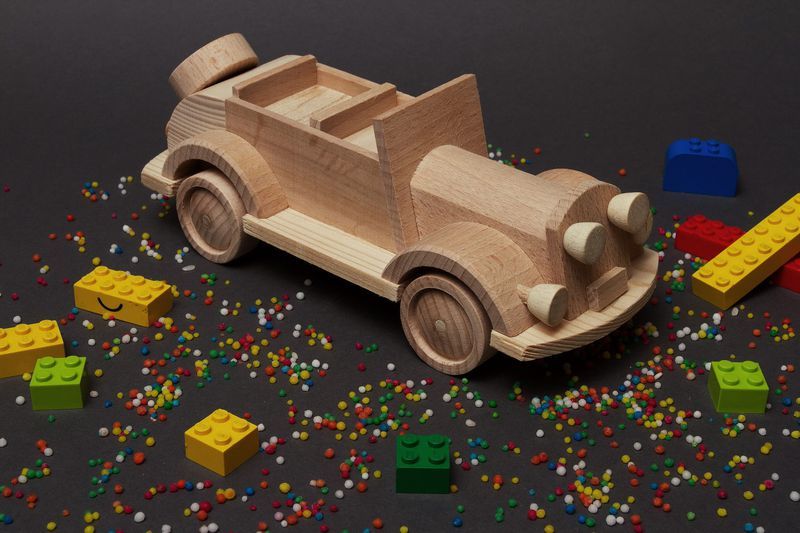 Wooden toy car made by hands.