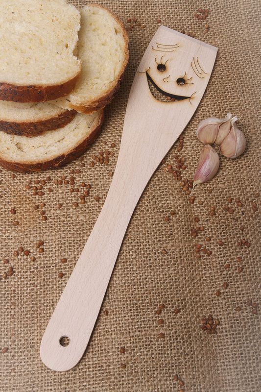 Wooden spatula, cooking utensil, kitchen ware.