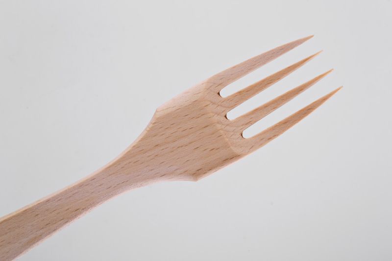 Wooden fork made by hands.
