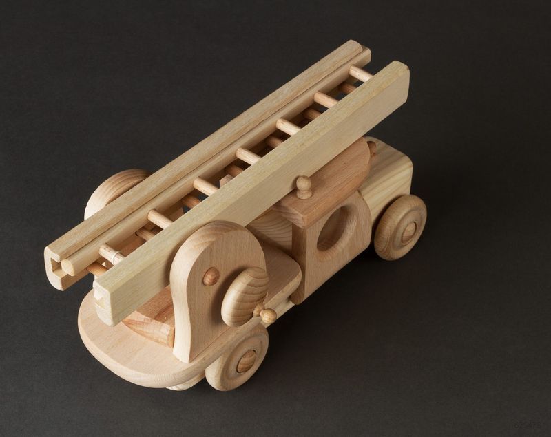 Children's wooden fire engine for play and creativity.