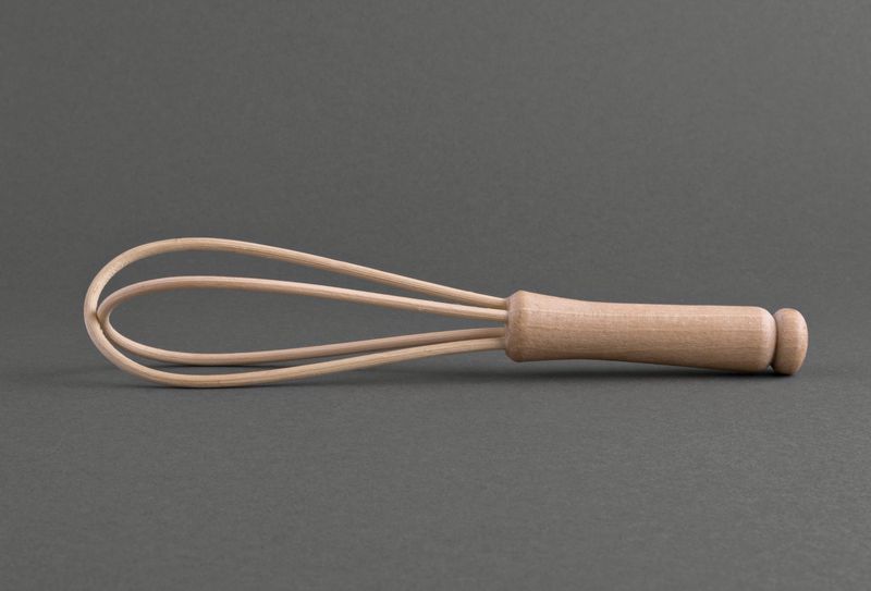 Wooden whisk made by hands.