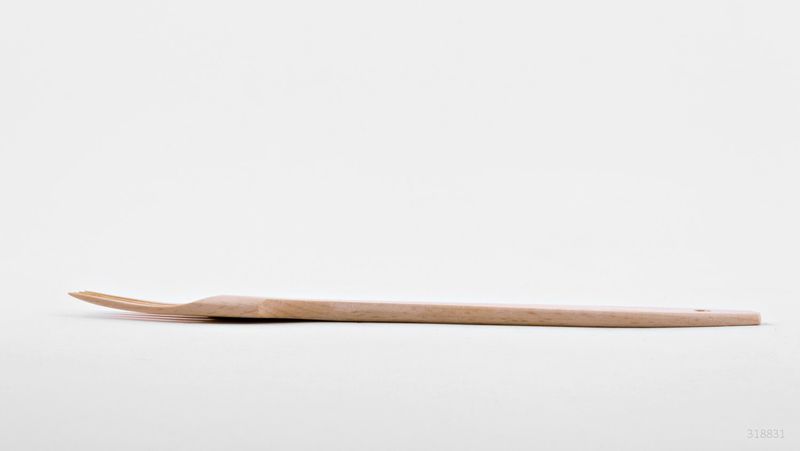 Wooden fork made by hands.