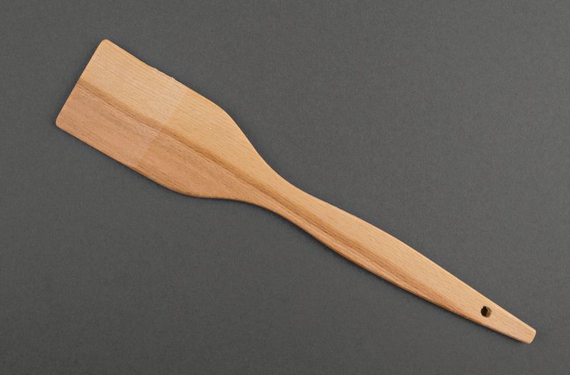 Wooden spatula, cooking utensil.