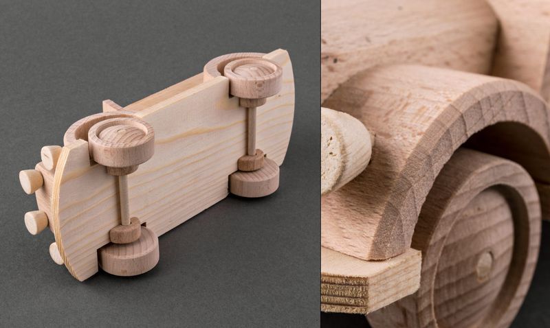 Wooden toy car made by hands.