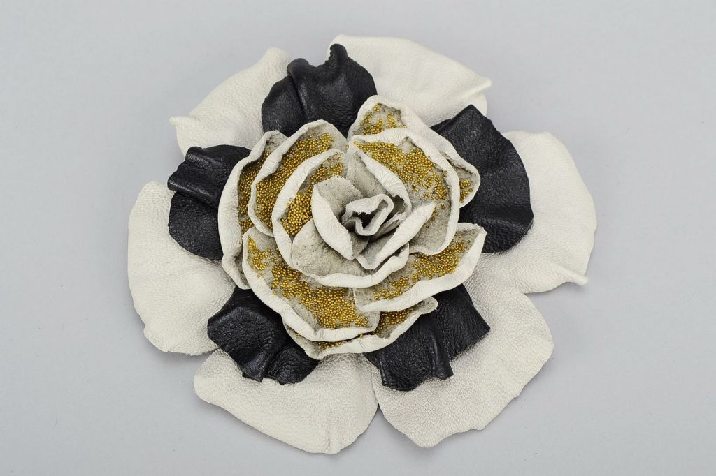 Handmade leather brooch in the form of a flower