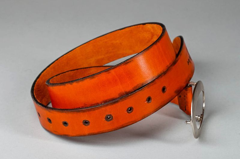Leather belt with author's stamping