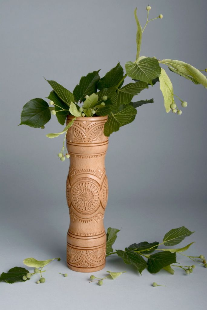 Wooden carved vase for dry flowers