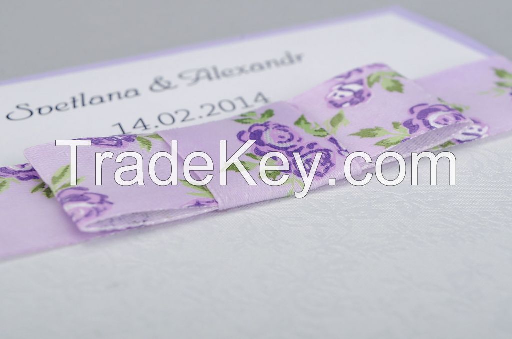 Wedding invitation of white and lilac color