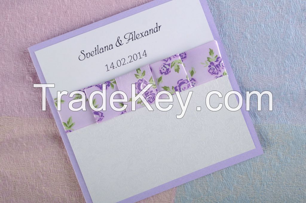 Wedding invitation of white and lilac color