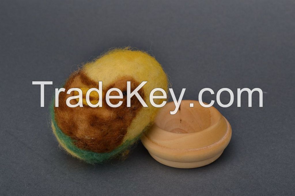 Egg on a wooden holder