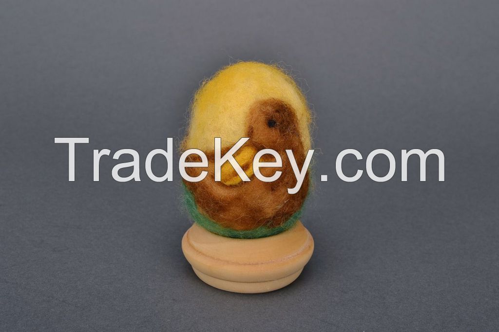 Egg on a wooden holder