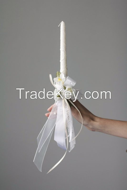 Wedding candle with white ribbons