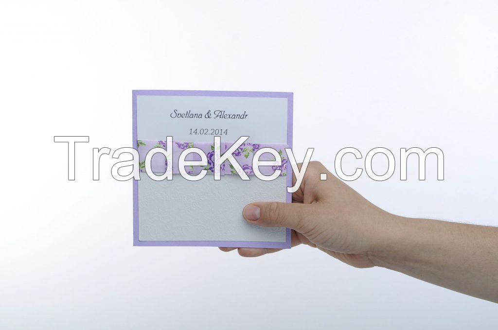 Wedding invitation of white and lilac color