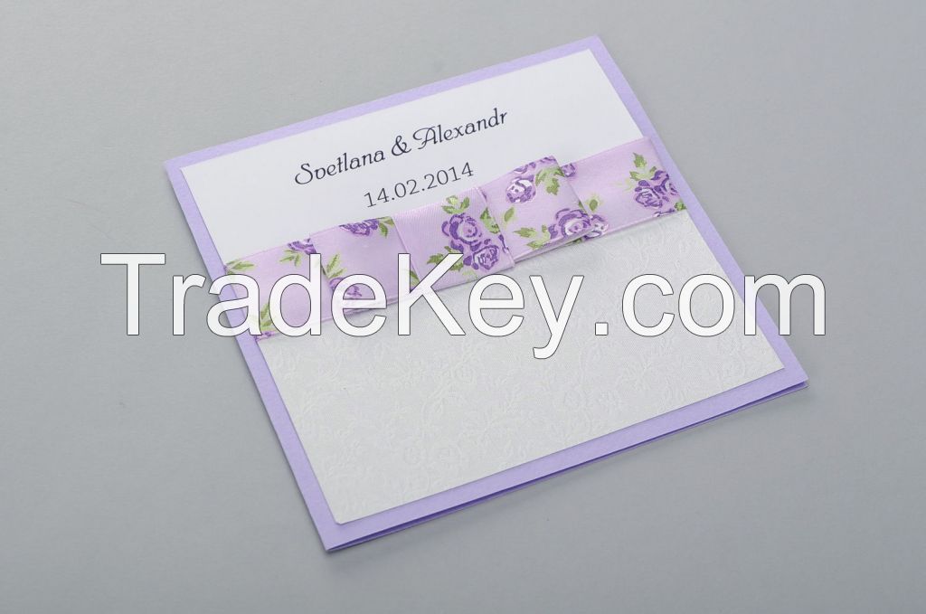 Wedding invitation of white and lilac color