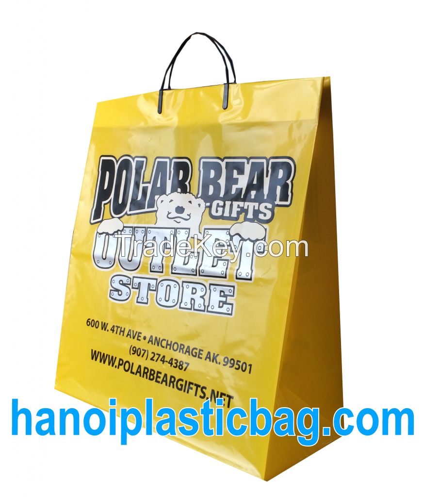 Rigid handle plastic bag