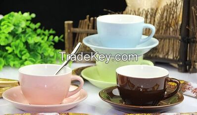 color coffee cup and saucer