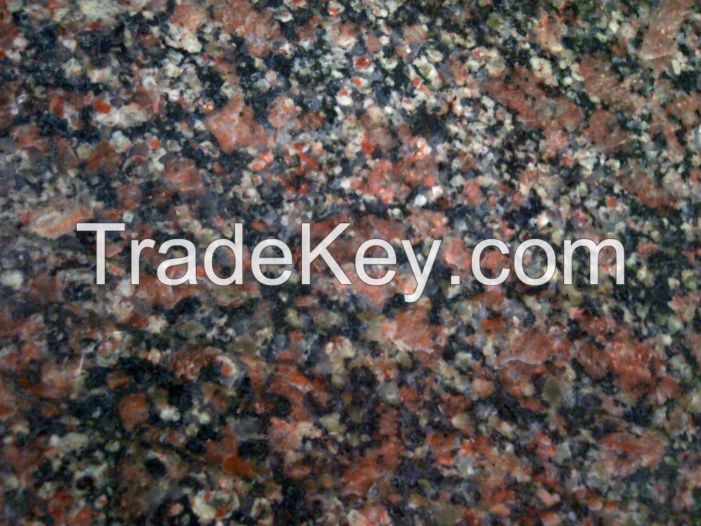 Flesh Red coloured rough granite blocks and processed granite tiles and slabs of required sizes.
