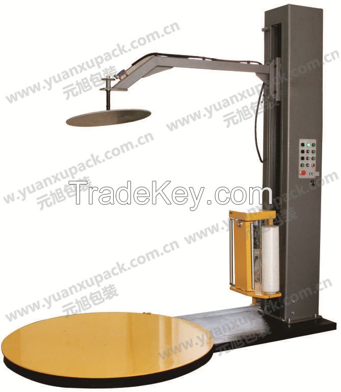 Top-press pallet wrapping machine
