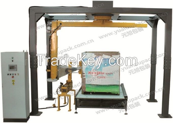 Rotary arm wrapping machine