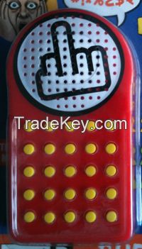 red sound machine with yellow button 