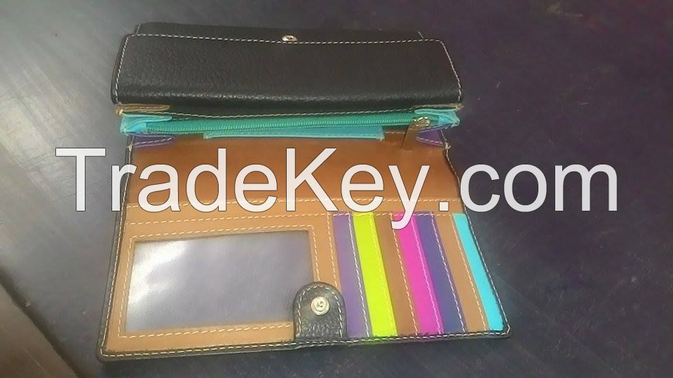 Leather Goods like Gents Wallet and Ladies Purse and Handbags