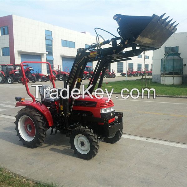 Small compact Jinma 244E tractor with front end loader and backhoe