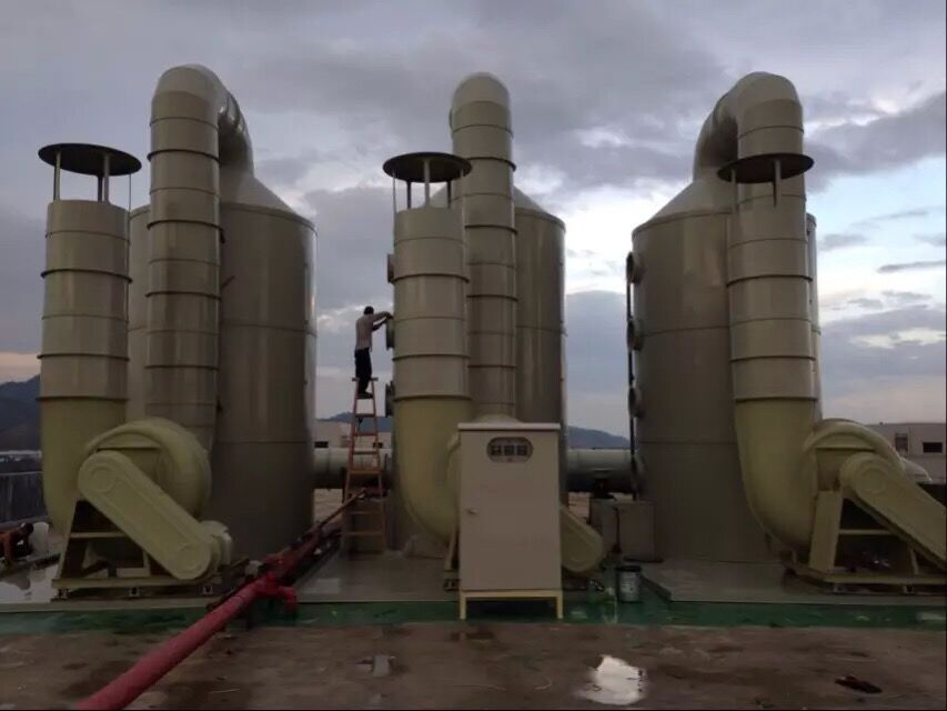 Exhaust gas treating tower