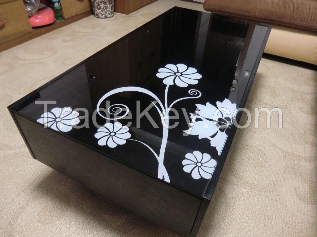 white table with black tempered glass top