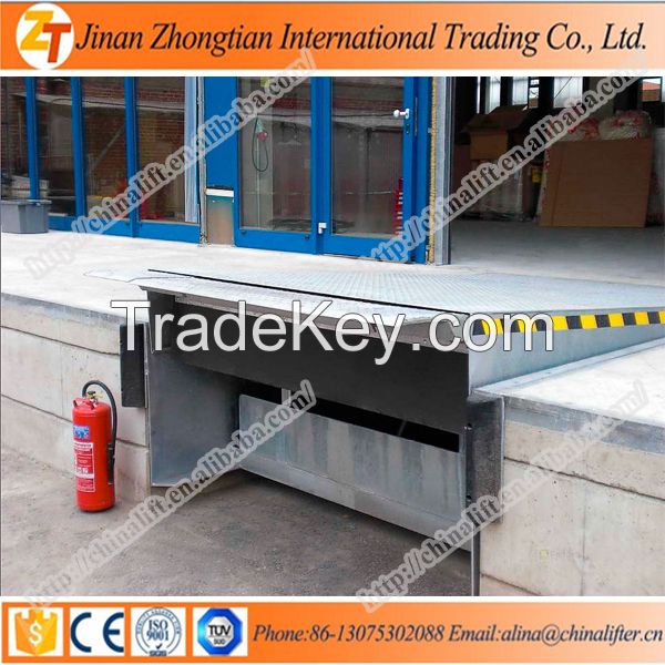 Hydraulic stationary dock leveller loading ramp for container with truck