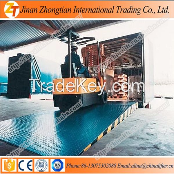 Hydraulic stationary dock leveller loading ramp for container with truck