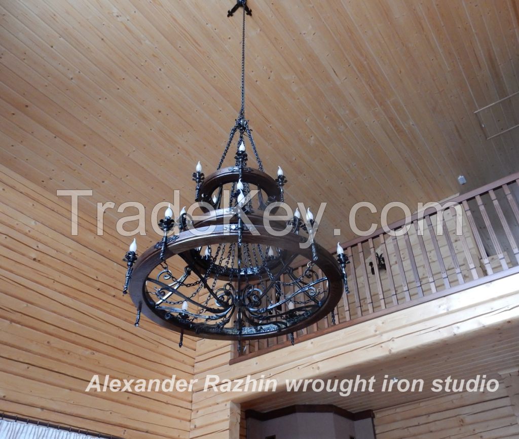 Large wrought iron chandelier, wagon wheel style.20 bulbs.