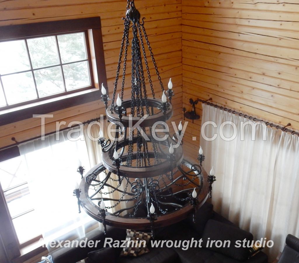 Large wrought iron chandelier, wagon wheel style.20 bulbs.