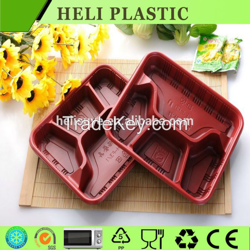 Disposable plastic food container with 4 compartments