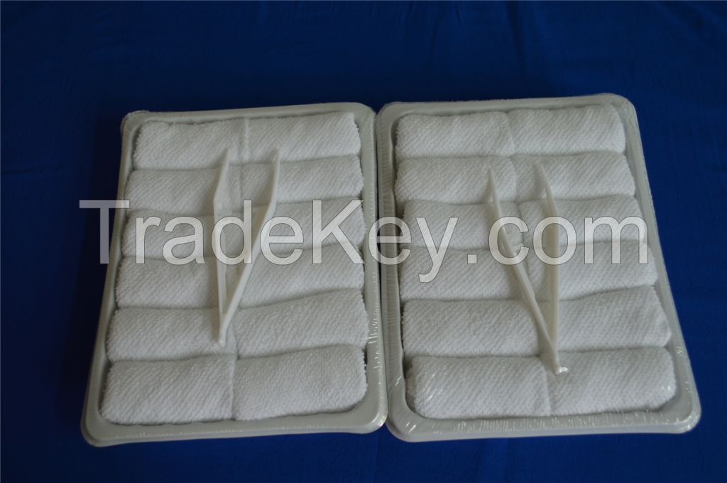 disposable cotton airline towels packed in tray