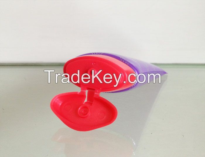 empty flexible plastic tube oval shape with double colors of flip cap 