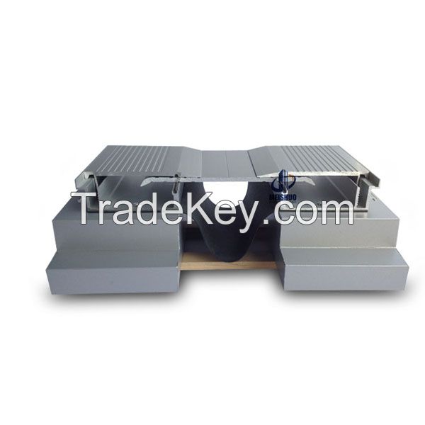 Glide plate system durable architectural metal profile screed expansion joint system