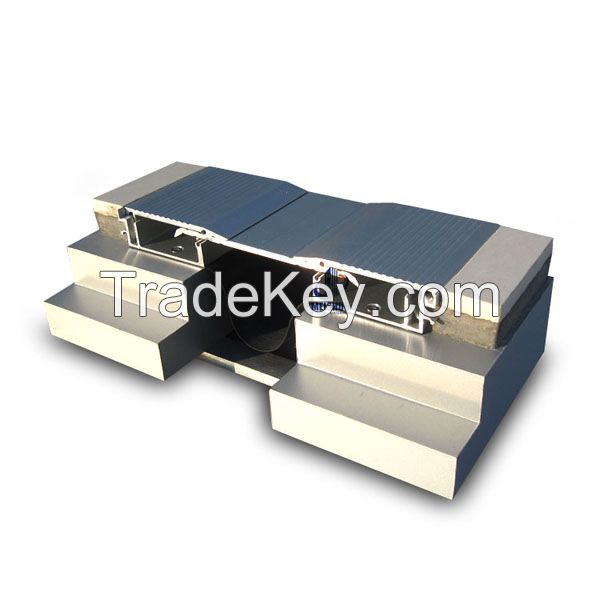 Glide plate system durable architectural metal profile screed expansion joint system